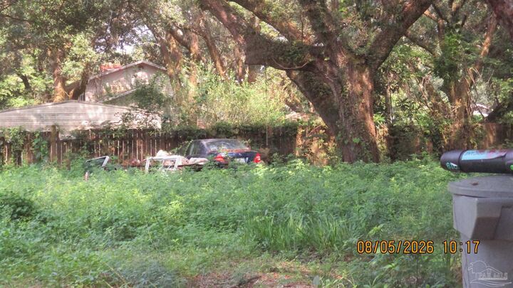 Property Photo:  9741 Fowler Ave  FL 32534 
