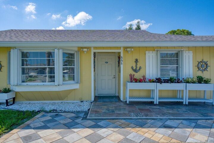 Property Photo:  888 NE Maranta Terrado  FL 34957 