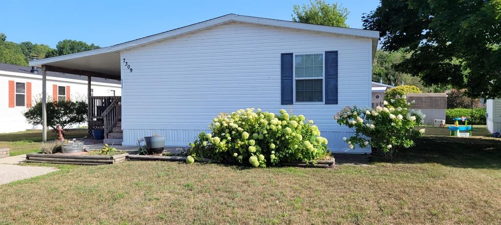 Property Photo:  7309 White Swan Lane  MI 49431 