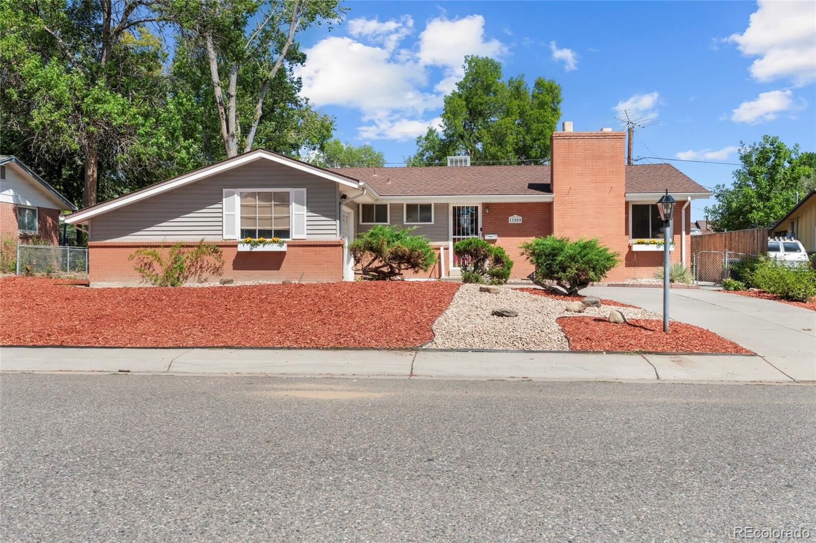 Property Photo: 11005 W 65th Avenue CO 80004