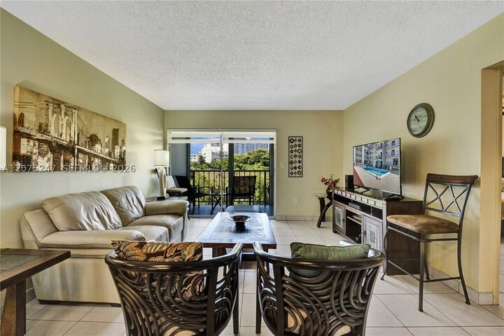 Property Photo:  201 178th Dr 403  FL 33160 