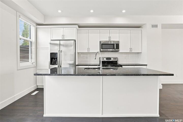 Property Photo: 701 Meadows Boulevard 724 SK S7V 0L3