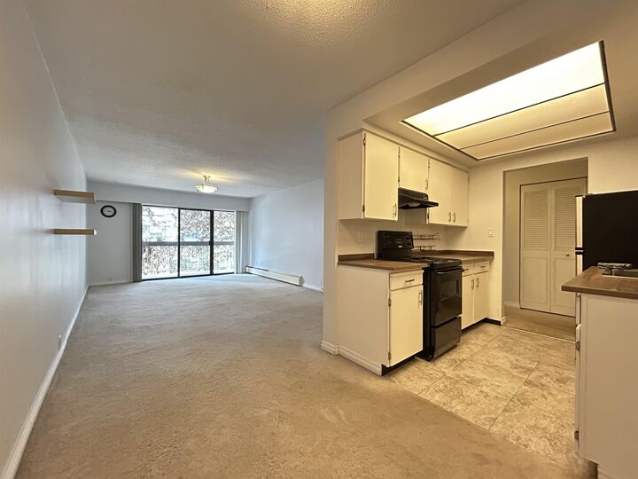 Property Photo:  6560 Buswell Street 201  BC V6Y 2G7 