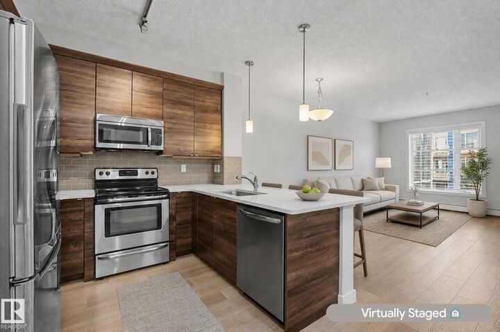 Property Photo: 2588 Anderson Way NW 301 AB T6W 0R2