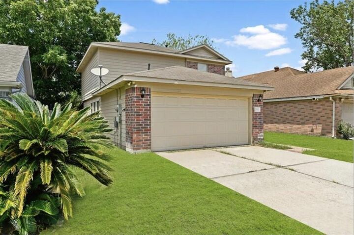 Property Photo: 2106 Tomlinson Trail Drive TX 77067