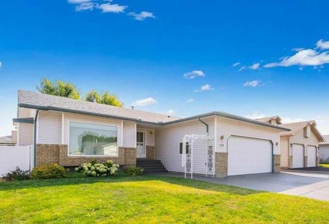 Property Photo: 159 Shannon Drive SE AB T1B 4C2