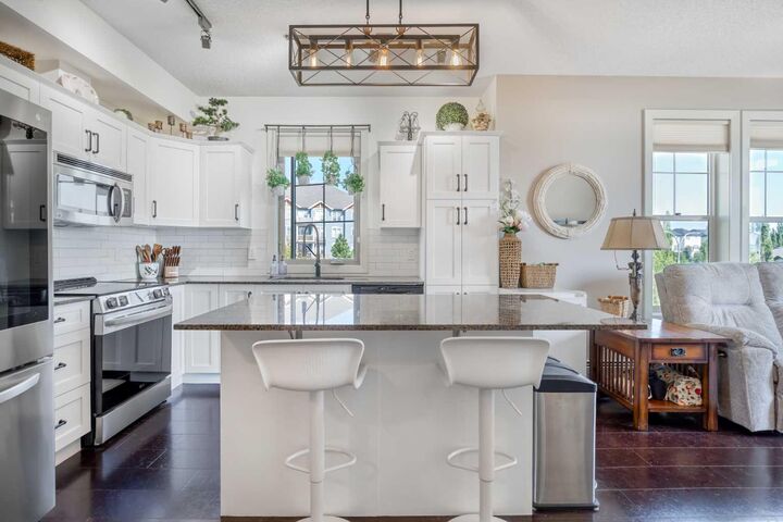 Property Photo: 205 Sunset Drive 320 AB T4C 0H6