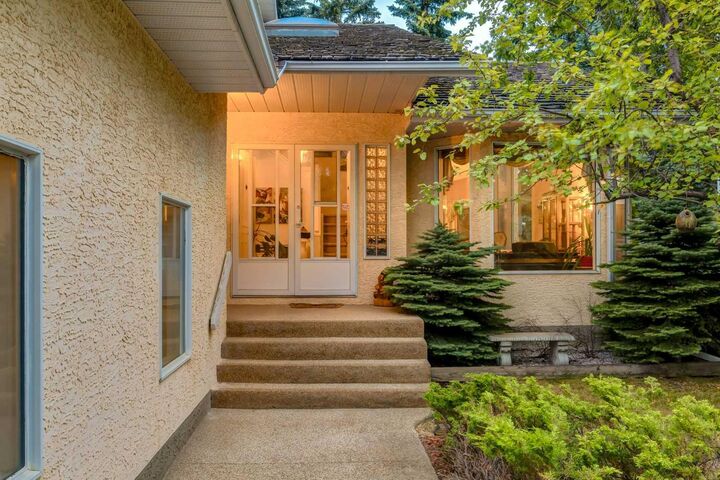 Property Photo: 660 Coach Grove Road SW AB T3H 1C6