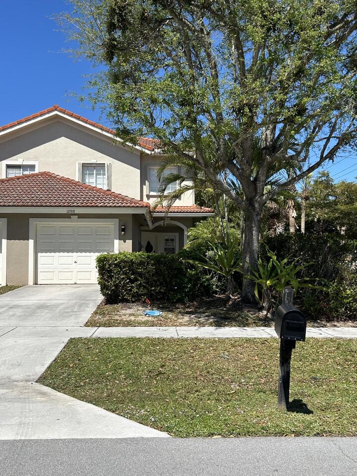 Property Photo: 12768 Westhampton Circle FL 33414