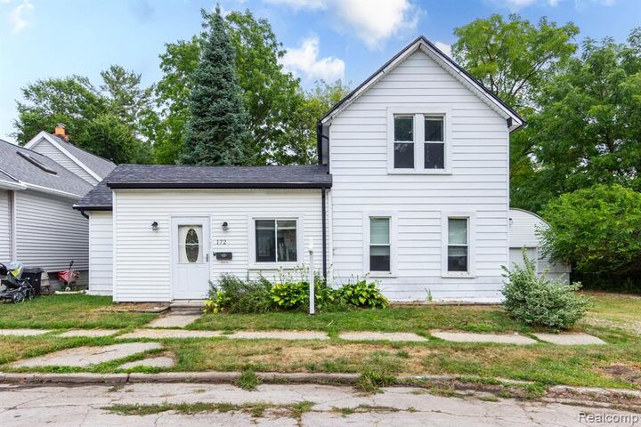 Property Photo:  172 Higgins Street  MI 48446 
