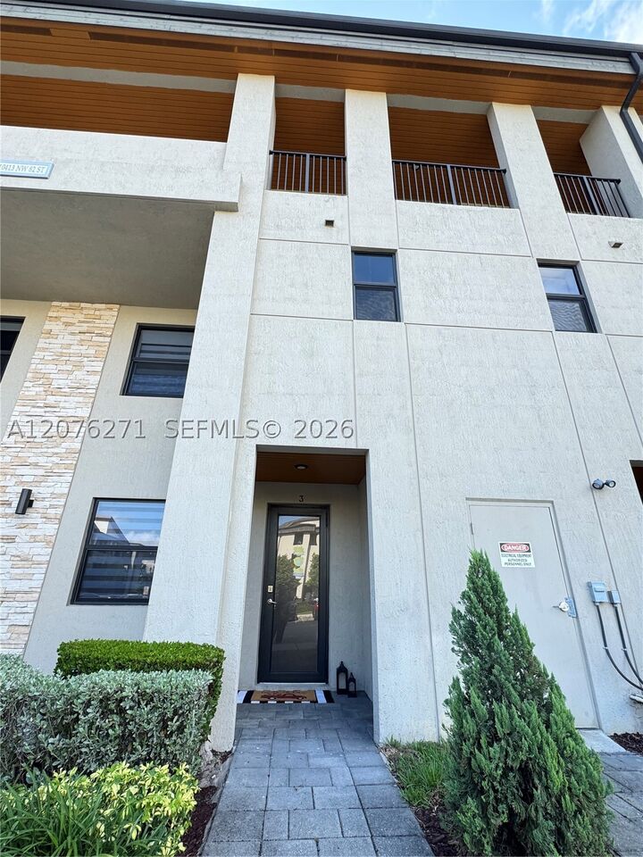 Property Photo:  10413 NW 82nd St 3  FL 33178 