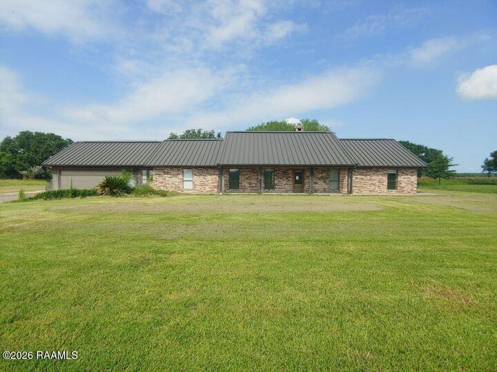 Property Photo:  545 Coulee Lanoire Road  LA 70512 