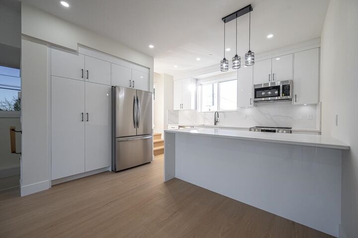 Property Photo: 7533 Wren Street C BC V2V 3C1