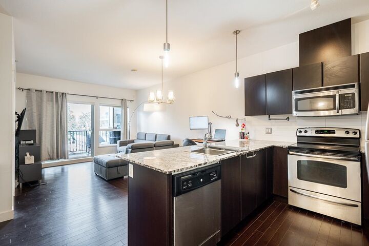 Property Photo: 9655 King George Boulevard 410 BC V3T 0C7