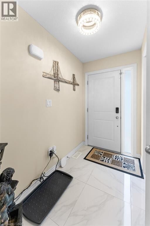 Property Photo: 60 Canterbury Drive 3 ON L2P 3M8