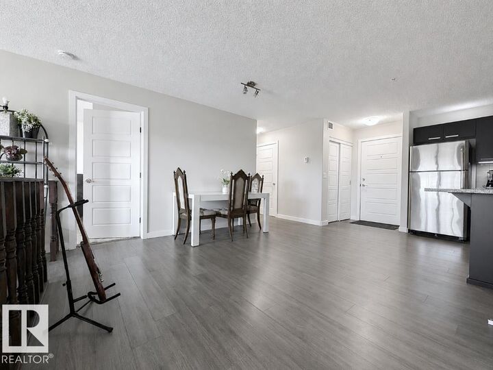 Property Photo:  14808 125 Street NW 311  AB T5X 0G1 