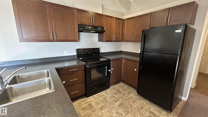 Property Photo: 5302 51 Street 305 AB T9N 2E3