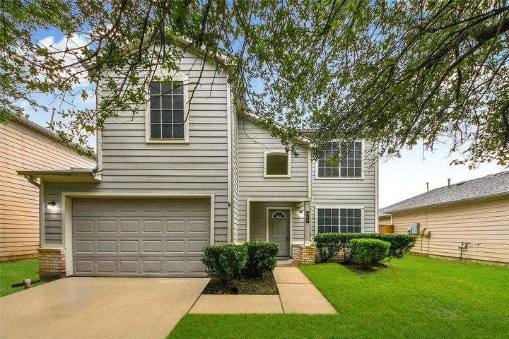 Property Photo:  915 Grand Plains Drive  TX 77090 
