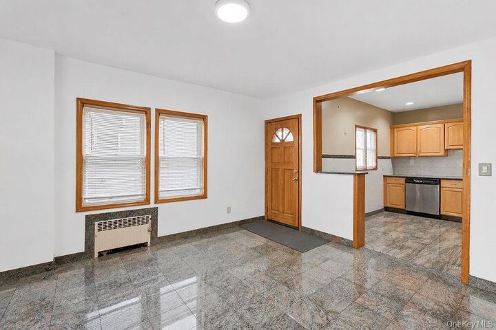 Property Photo:  99-11 159th Avenue  NY 11414 