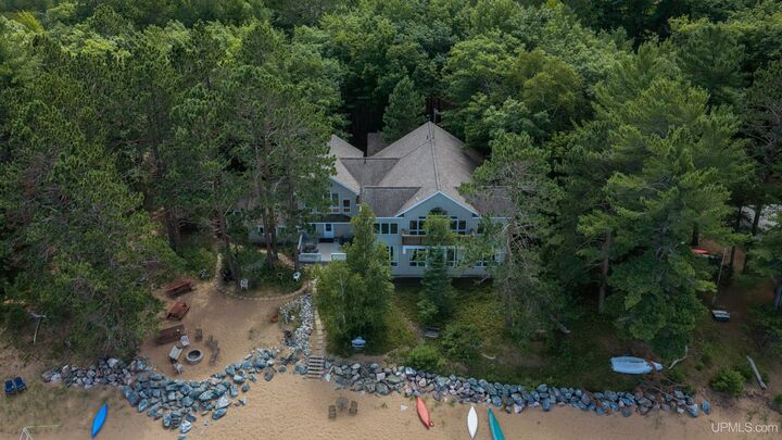 Property Photo:  3702 W Squaw Beach Road  MI 49808 