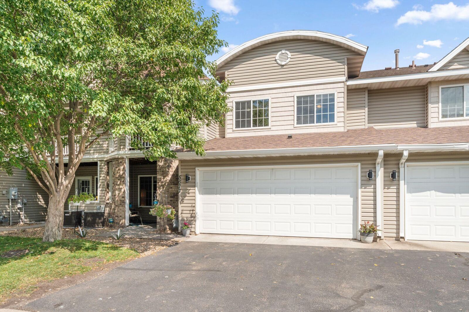 Property Photo:  5677 100th Lane N  MN 55443 