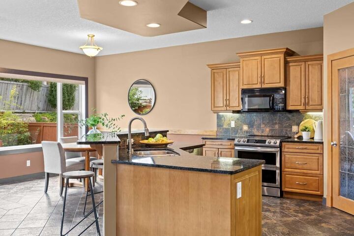 Property Photo: 139 Tuscany Ridge Close NW AB T3L 2K6