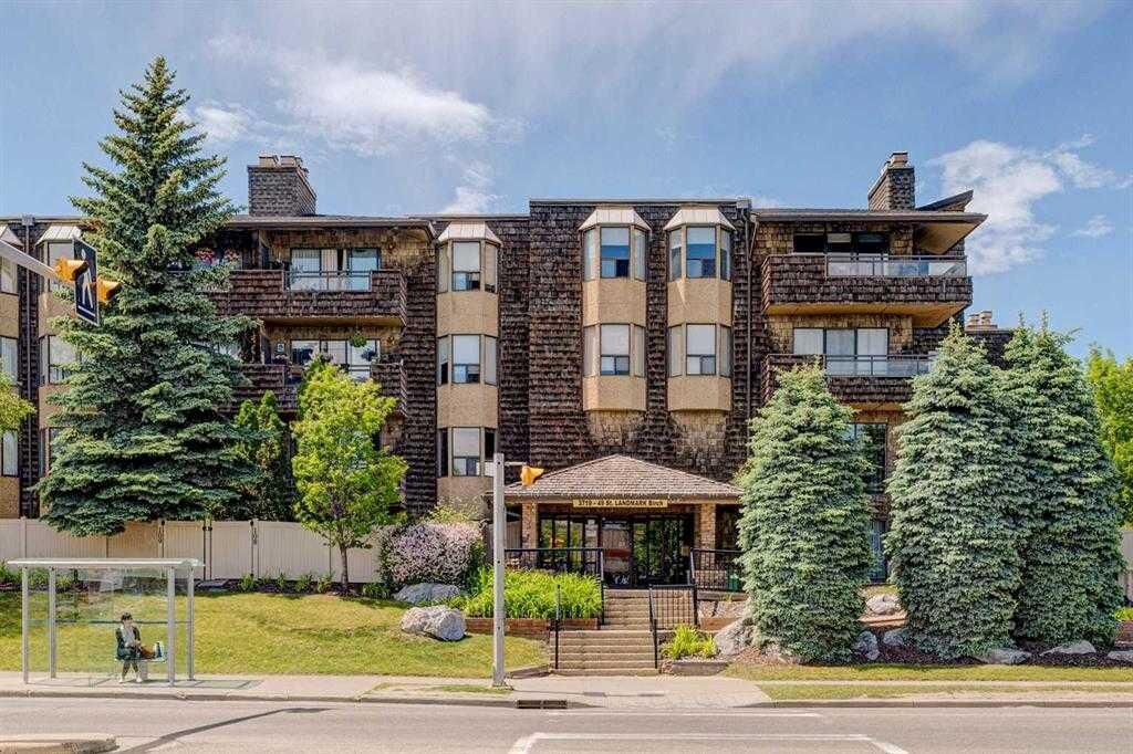 Property Photo: 3719C 49 Street NW 201 AB T3A 2E3