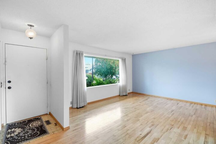 Property Photo: 299 Woodside Circle SW AB T2W 3K2
