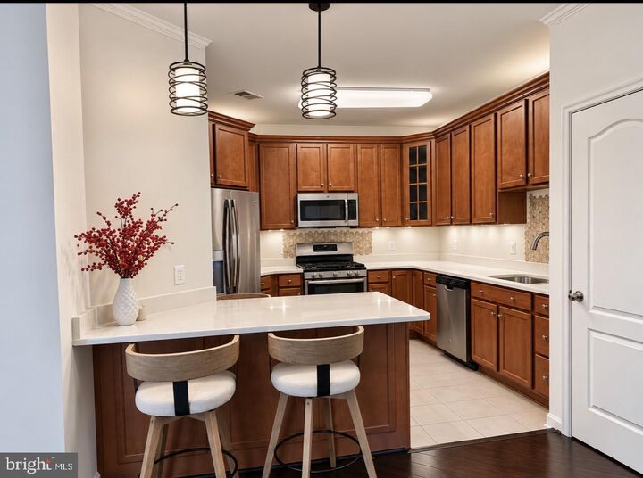 Property Photo:  41900 Metamorphic Square 400  VA 20105 