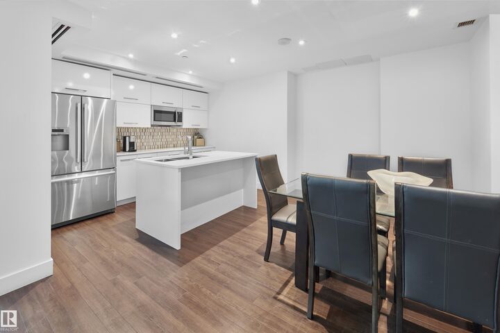 Property Photo: 11969 Jasper Avenue NW 502 AB T5K 0P1