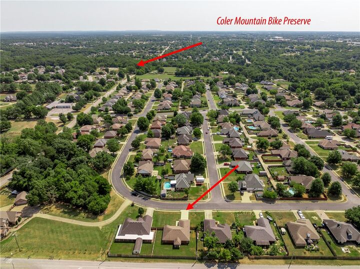 Property Photo:  120 NW Apple Blossom  AR 72712 