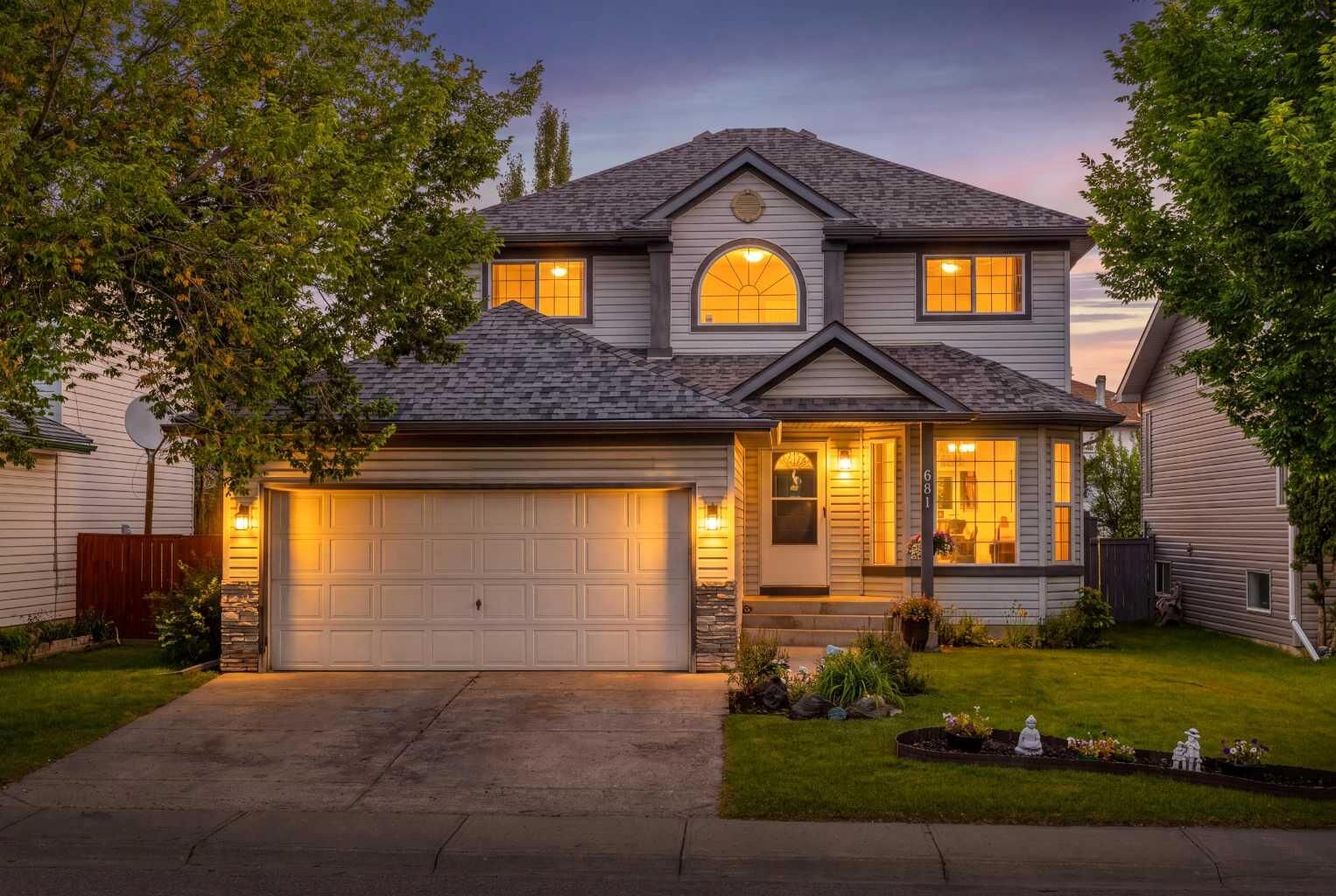 Property Photo: 681 Harvest Hills Drive NE AB T3K 4R3