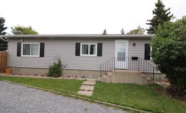 Property Photo:  353 Big Springs Drive SE  AB T4A 1B7 