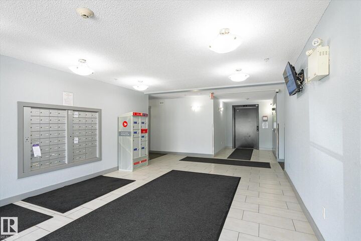 Property Photo:  11816 22 Avenue SW 409  AB T6W 2A2 