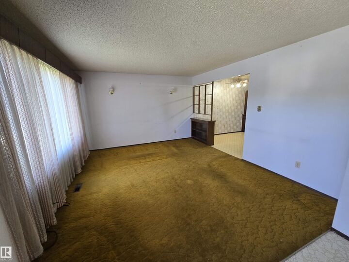 Property Photo:  12020 54 Street NW  AB T5W 3N3 
