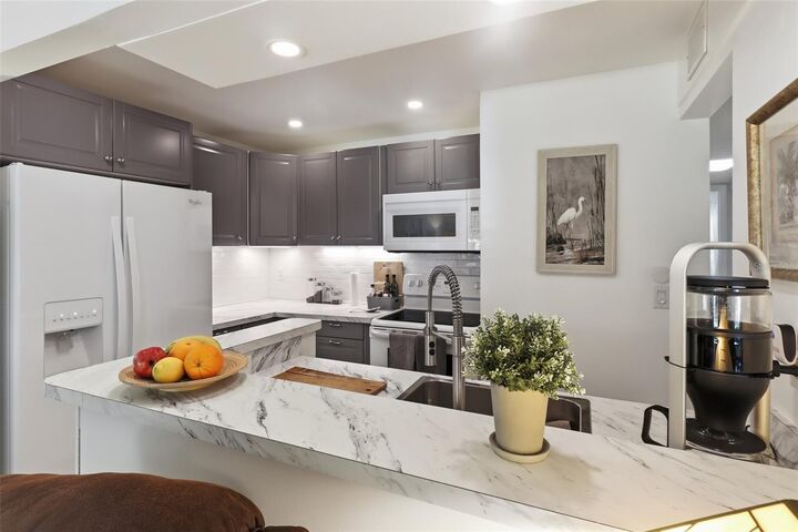 Property Photo:  130 Jasmine Woods Court 7C  FL 32725 