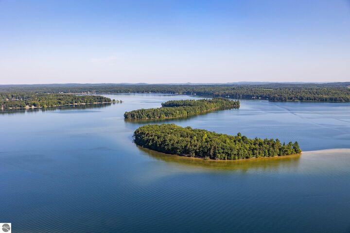 Property Photo:  9321 N Long Lake Road  MI 49684 