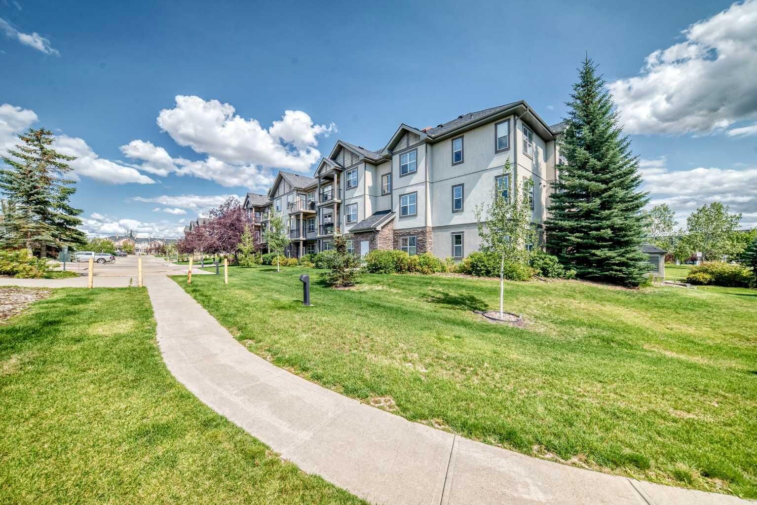 Property Photo:  37 Prestwick Drive SE 204  AB T2Z 4Z2 