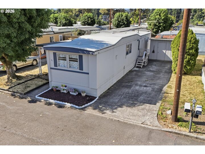 Property Photo:  4400 SE Roethe Rd  OR 97267 