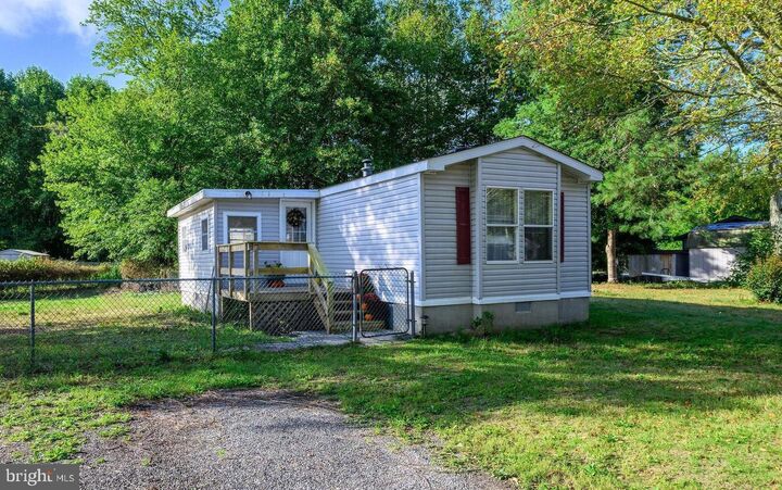Property Photo: 37088 E White Tail Drive DE 19975