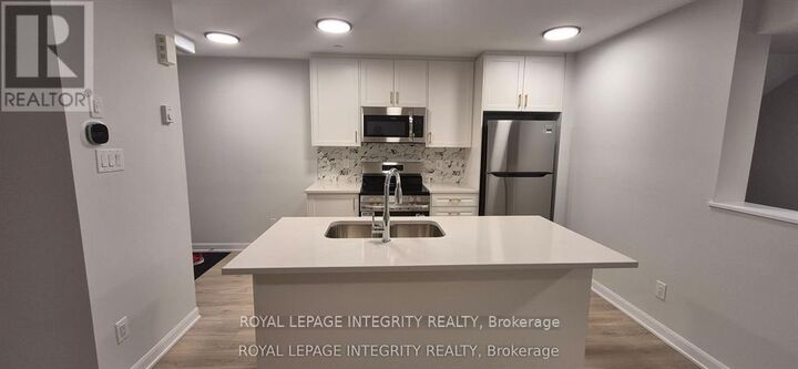 Property Photo:  401 Glenroy Gilbert Drive 8  ON K2J 7N7 