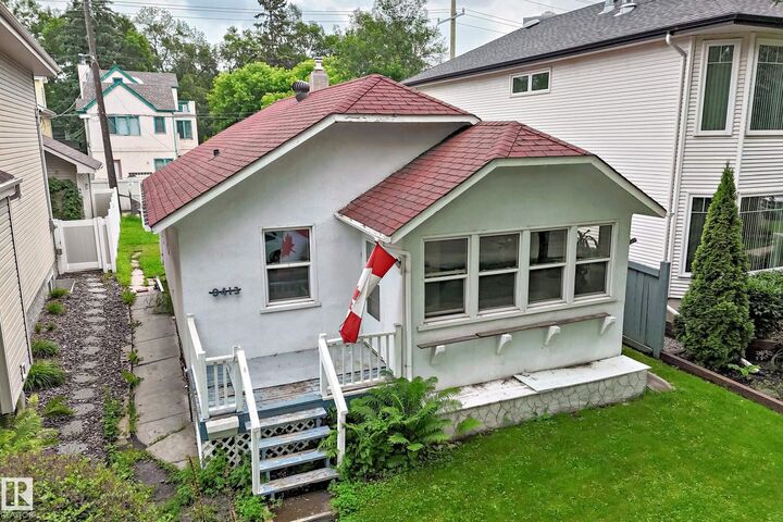 Property Photo:  9413 101 Street NW  AB T5K 0W5 
