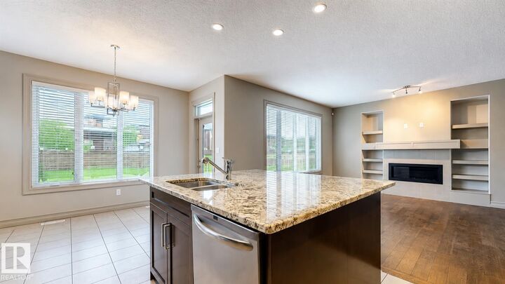 Property Photo: 885 Windermere Wynd NW AB T6W 2M6