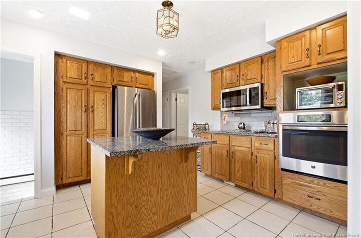 Property Photo:  105 Legion Drive  NB E3A 2K9 