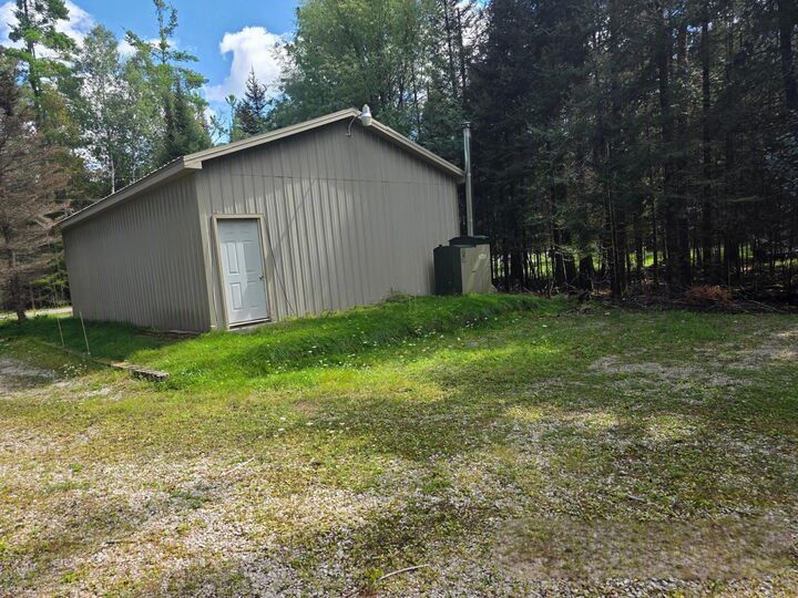 Property Photo: 12506 E Shore Drive MI 49759