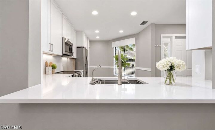 Property Photo:  506 Courtside Drive E201  FL 34105 