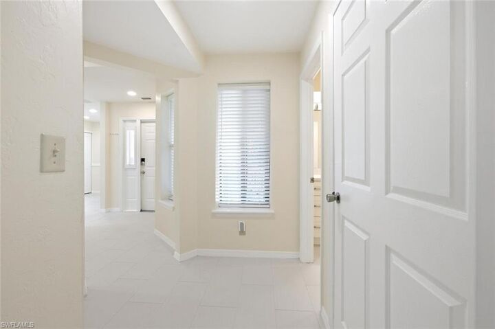 Property Photo:  506 Courtside Dr E201  FL 34105 