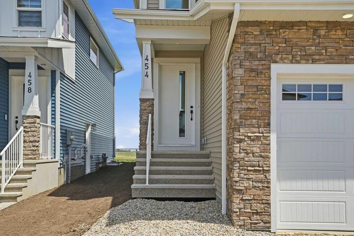 Property Photo:  454 Kinniburgh Loop  AB T1X 3C2 