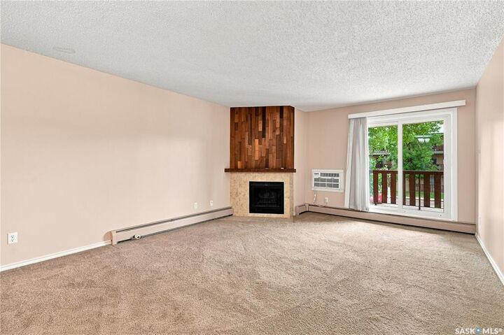 Property Photo:  1121 McKercher Drive 207E  SK S7H 5B8 