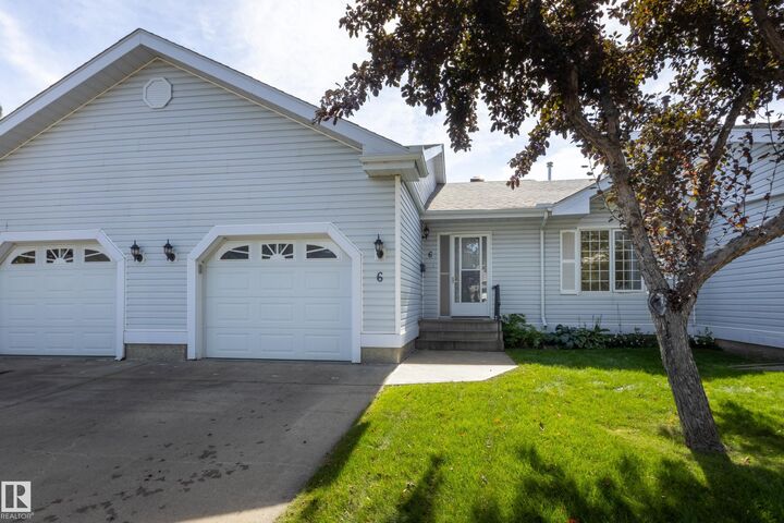 Property Photo:  9704 165 Street NW 6  AB T5P 4W4 